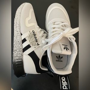 Adidas sneakers, like new. Wore once to try on but never outside.